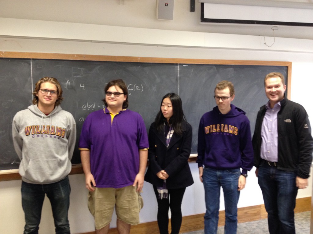 Winning Williams team of Gregory Kehne (41/60), Sam Donow (37/60), Zhiqi Li (44/60) and Granger Carty (57/60). Faculty advisors Eyvindur Ari Palsson and Frank Morgan (behind the camera).